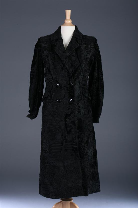 LADYS BLACK LAMB FUR COAT.
