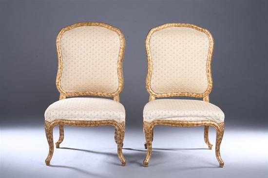 PAIR ROCOCO STYLE GILT SLIPPER CHAIRS, early 20th century, with cream flora