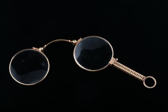 14K YELLOW GOLD LORGNETTE, late 19th-early 20th century. - L: 3 5/8 in.
