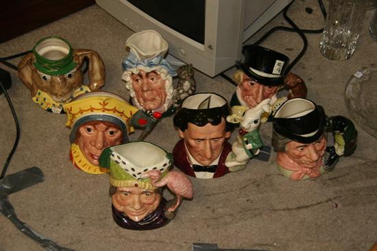 SEVEN ROYAL DOULTON CHARACTER JUGS FROM ALICE IN WONDERLAND. - 7 1/2 in. hi