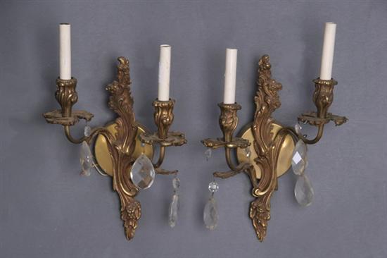 PAIR GILT-BRONZE AND CRYSTAL TWO-LIGHT WALL SCONCES, early 20th century. -