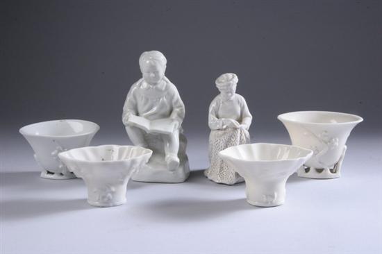 TWO CHINESE BLANC-DE-CHINE PORCELAIN FIGURES AND FOUR CUPS. - Largest figur