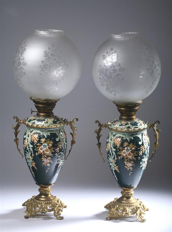 PAIR CONTINENTAL OIL LAMPS. - 25 in. high.
